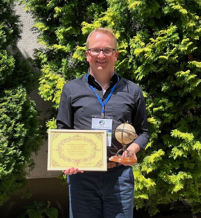 Stefan Petersen mit dem WFPhC Award 2024.